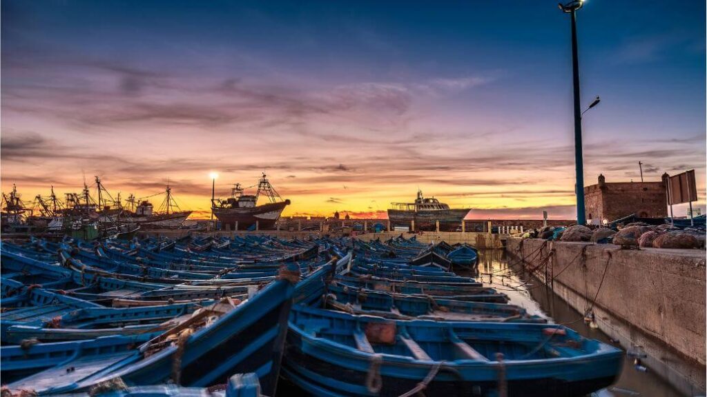 Private Excursion Marrakech to Essaouira showcasing Essaouira’s picturesque Atlantic coast and traditional fishing boats