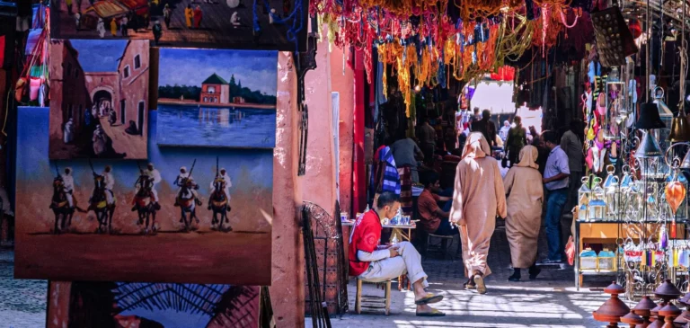 Private tour guide in Morocco leading tourists through the Marrakech medina