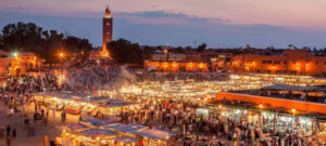 Parents and kids visiting Jemaa el-Fna square in Marrakech Family Activities